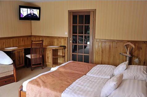 Trojka Hotel Es Panzio Solnoca Cameră foto